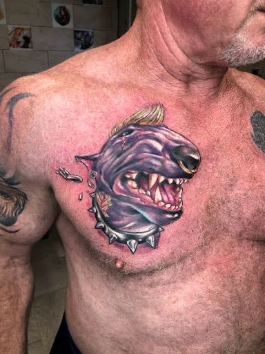 Explore grumpy bear tattoo ideas, creative tattoo ideas in Luverne, available at Conspiracy Tattoo MN