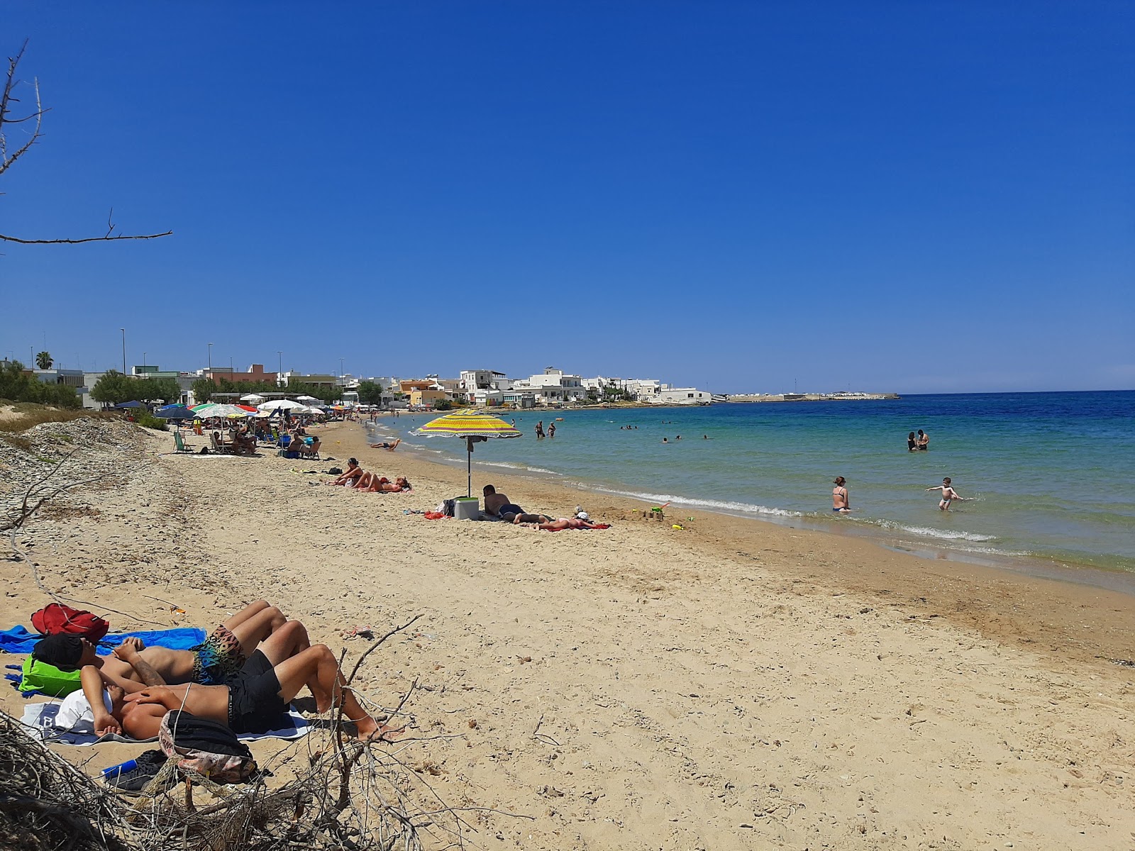 Fotografija Olindo's beach z svetel pesek površino