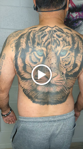 Explore american flag sleeve tattoo ideas, creative tattoo ideas in Longmont, available at Sharkys Paradise