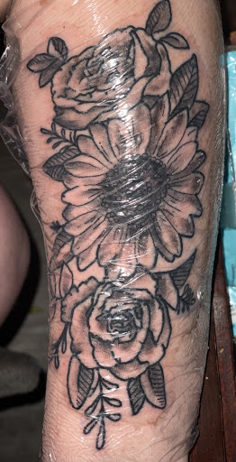 Explore sun tattoo ideas, creative tattoo ideas in San Andreas, available at Candlewood Tattoo Studio