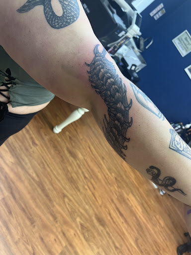 Explore colourful tattoo ideas, creative tattoo ideas in Cocoa, available at Rorschach Tattoo Shop and Piercing Studio