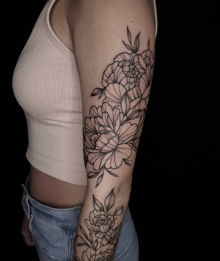 Explore kneecap tattoo ideas, creative tattoo ideas in Charlotte, available at Canvas Tattoo & Art Gallery