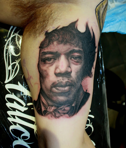 Explore arm cross tattoo ideas, creative tattoo ideas in Studio City, available at Studio City Tattoo