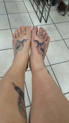 Explore dog groomer tattoo ideas, creative tattoo ideas in Waukesha, available at Waukesha Tattoo Company Galleria Edge