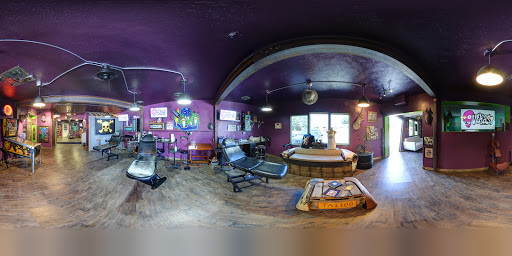 Explore male wedding ring tattoo ideas, creative tattoo ideas in Springfield, available at Outkast Tattoo Co