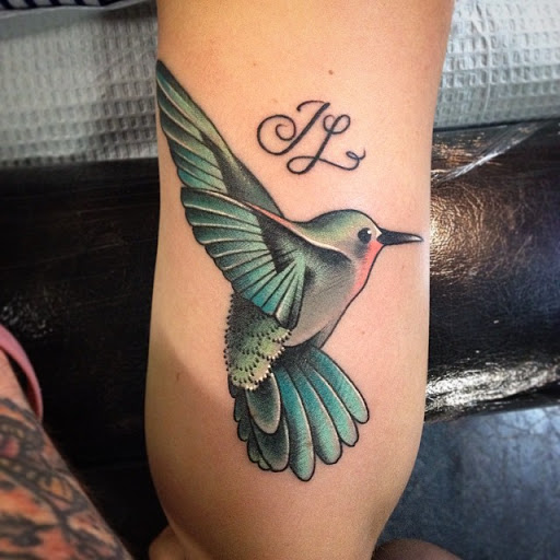 Find tattoos with letters ideas for your next unique tattoo in Dekalb at Proton Tattoo