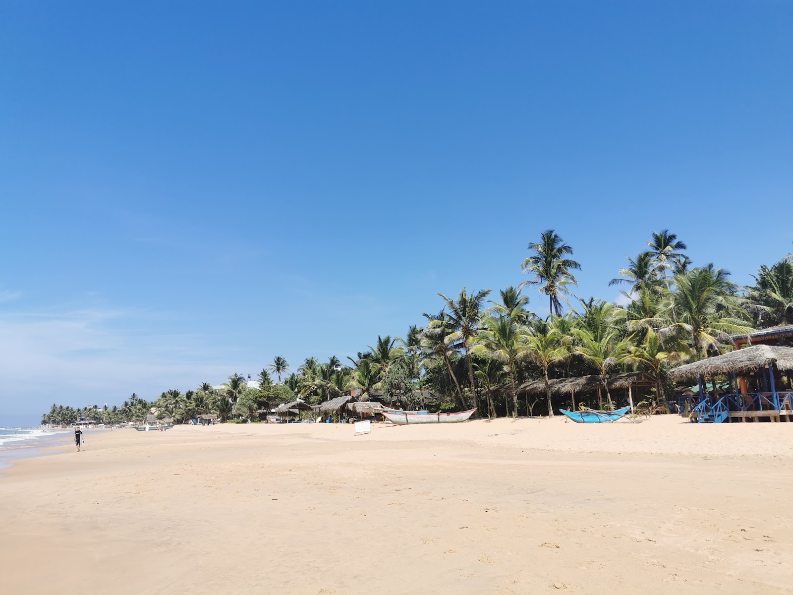 Narigama Beach'in fotoğrafı - rahatlamayı sevenler arasında popüler bir yer