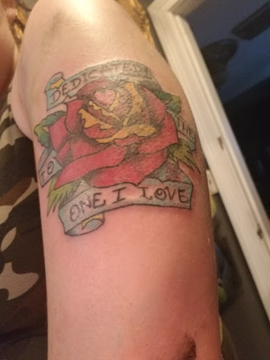 Explore bear paw tattoo ideas, creative tattoo ideas in Fuquay Varina, available at 401 Tattoo and Antiquities