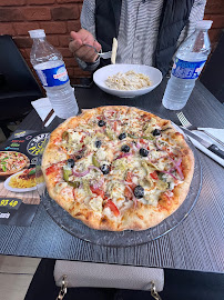 Plats et boissons du Pizzeria Captain's Pizza à Paris - n°4
