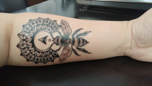 Explore silver lining tattoo ideas, creative tattoo ideas in El Cajon, available at E C Tattoo & Body Piercing