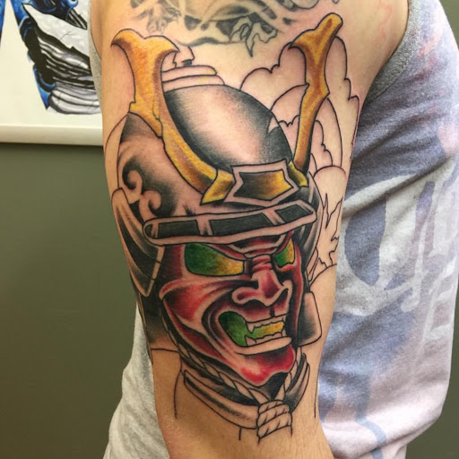 Explore upper arm tattoo ideas for females, creative tattoo ideas in Southaven, available at Illusion Ink