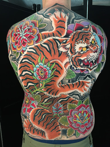 Explore santa tattoo ideas, creative tattoo ideas in Swannanoa, available at Iron Wolves Tattoo