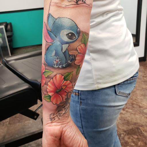 Find tattoo ideas for tummy tuck scars for your next unique tattoo in Nacogdoches at Blue Lotus Piercing and Tattoo