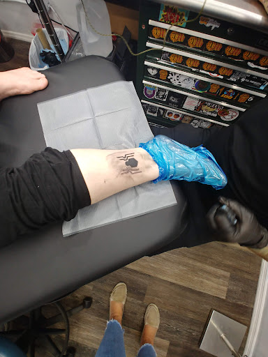 Explore to infinity and beyond tattoo ideas, creative tattoo ideas in Bradenton, available at Classic Ink Tattoo Studio