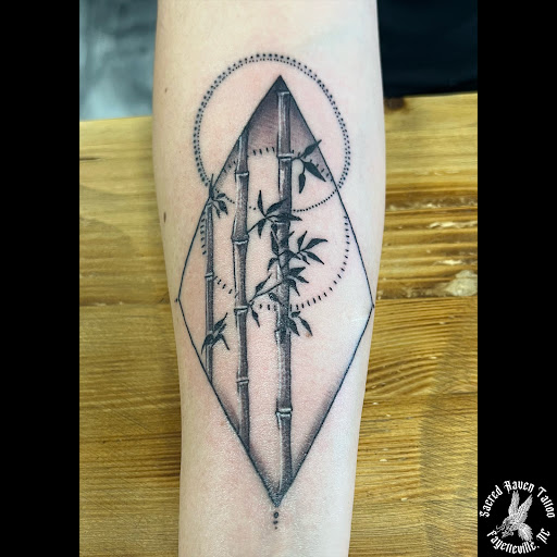 Explore face tattoo ideas for females, creative tattoo ideas in Fayetteville, available at Sacred Raven Tattoo Shop