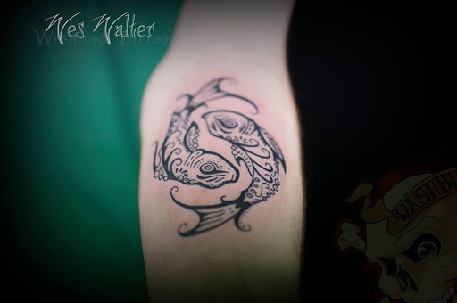 Explore last name tattoo ideas on arm, creative tattoo ideas in Saint Johnsbury, available at Washburn Tattoo