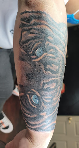 Explore family silhouette tattoo ideas, creative tattoo ideas in Slidell, available at 504 Ink Tattoos