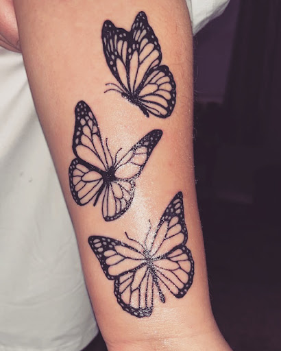 Explore fine line tattoo ideas, creative tattoo ideas in North Tonawanda, available at Dark Side Ink Tattoo Studio