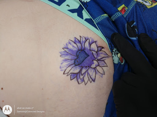 Explore basketball tattoo ideas leg, creative tattoo ideas in Rapid City, available at Convicted Designs Tattoo & Piercing