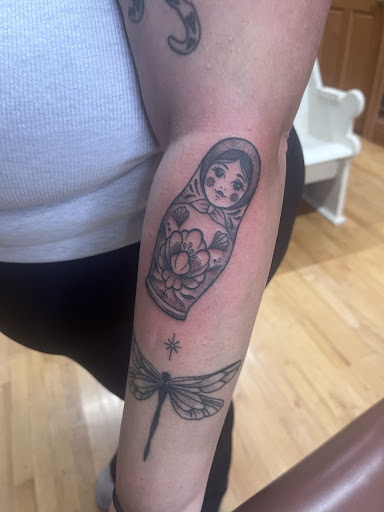 Explore divorce tattoo ideas for guys, creative tattoo ideas in Muncie, available at Fox & Sparrow Tattoo