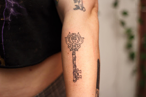 Explore never give up tattoo ideas, creative tattoo ideas in Melbourne, available at The Selfcare Trifecta