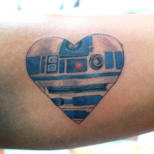 Explore chest plate tattoo ideas, creative tattoo ideas in Fort Myers, available at Tiger Lotus Tattoo and Piercing