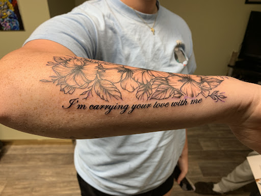Explore cover up ideas for wrist tattoo, creative tattoo ideas in Kirksville, available at Bedford Legacy Tattoo and Body Piercing
