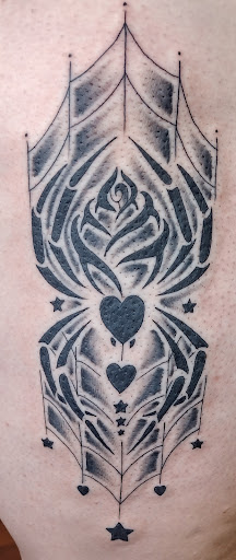 Explore stomach tattoo ideas for women, creative tattoo ideas in Shippensburg, available at LAZY WIZARD TATTOOS