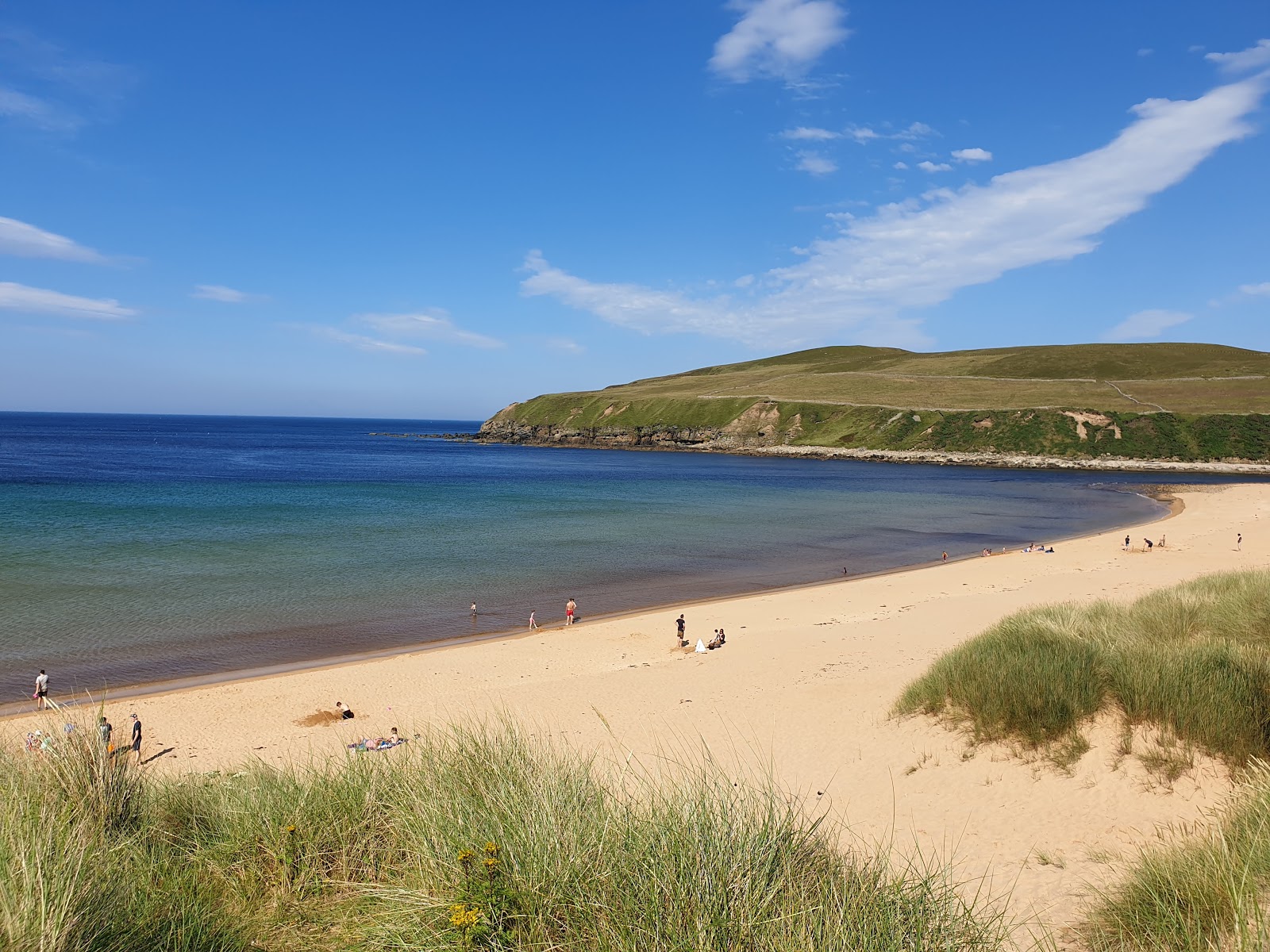 Foto av Melvich Beach med ljus sand yta