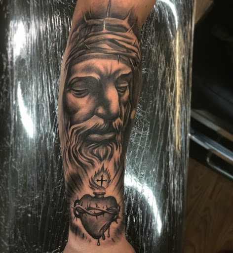 Explore flower arm sleeve tattoo ideas, creative tattoo ideas in Cranston, available at Lengendary Ink