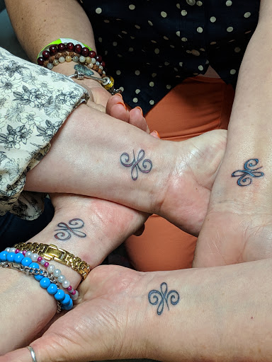 Explore solar eclipse tattoo ideas, creative tattoo ideas in Myrtle Beach, available at Aces High Tattoo