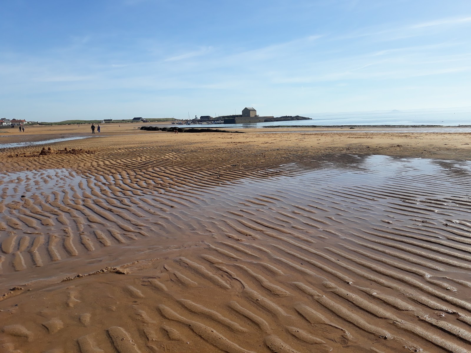 Foto de Elie Beach com água cristalina superfície