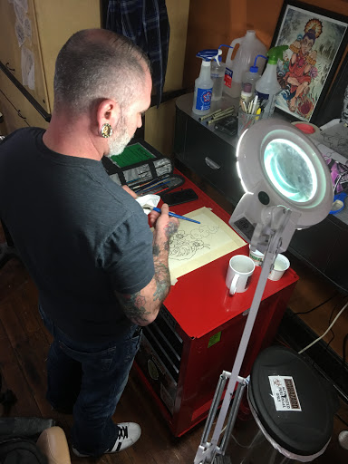 Tattoo Shop «Moth Studio», reviews and photos, 428 W Commercial St, Springfield, MO 65803, USA