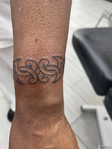 Explore motley crue tattoo ideas, creative tattoo ideas in Panama City Beach, available at Mango Beach Tattoo & Piercing