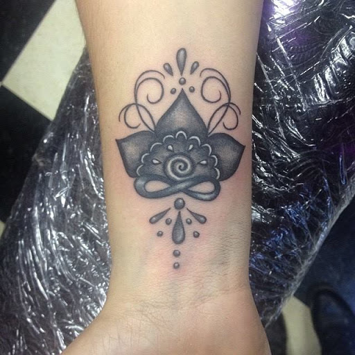 Explore cover up tattoos ideas forearm, creative tattoo ideas in Endicott, available at Live 2 Imagine Tattoo Studio