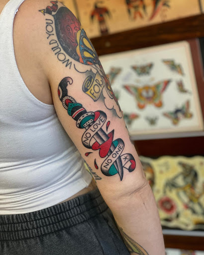 Explore patriotic sleeve tattoo ideas, creative tattoo ideas in Wappingers Falls, available at Graceland Tattoo
