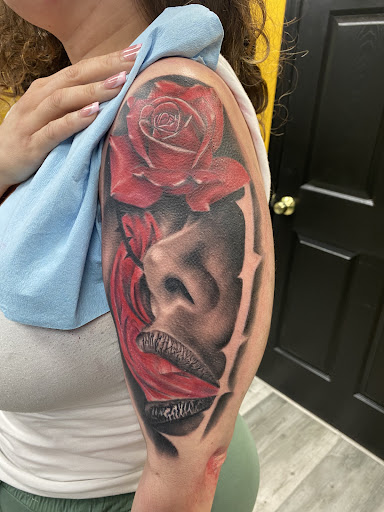 Explore tattoo back cover up ideas, creative tattoo ideas in Avon Park, available at Lions Den Ink Studio at The Collective