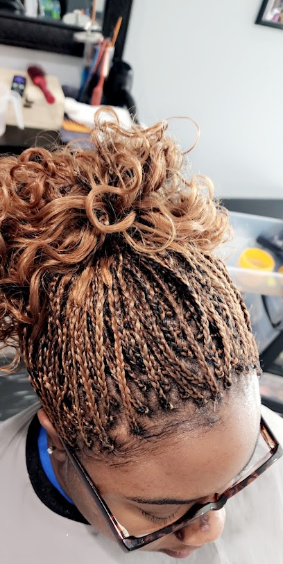Aisha M. African Hair Braiding