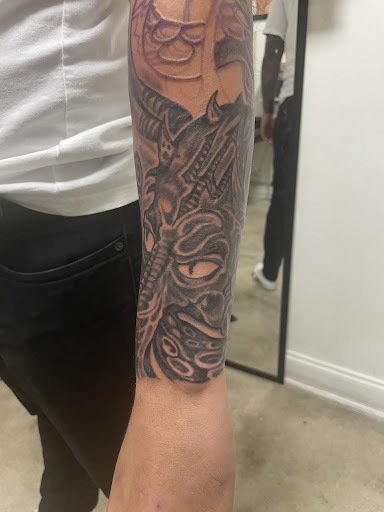 Explore paint tattoo ideas, creative tattoo ideas in Miami, available at Bonsai Mike Tattoos