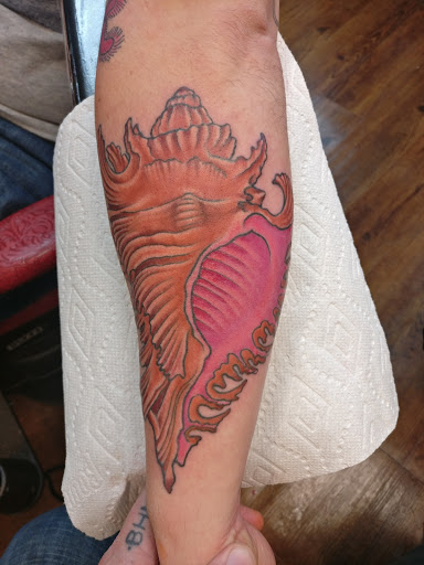 Explore fishing tattoo ideas for men, creative tattoo ideas in Eagle River, available at Eagle River Tattoo