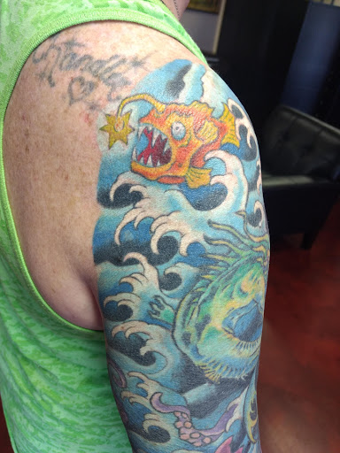 Explore tattoo finger ideas, creative tattoo ideas in Swannanoa, available at Iron Wolves Tattoo