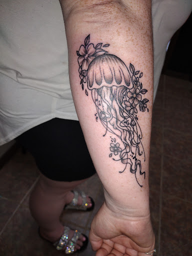 Explore tlou tattoo ideas, creative tattoo ideas in Searcy, available at Eternal Art Tattoo Studio lc