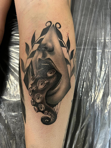 Explore annabelle tattoo ideas, creative tattoo ideas in Wisconsin Dells, available at Twisted Dimensions Tattoo Studio