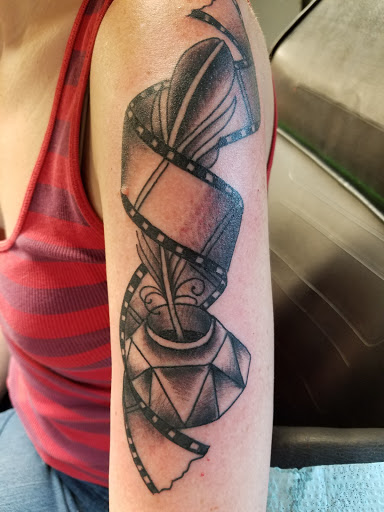 Explore men back tattoo ideas, creative tattoo ideas in Sanford, available at Ink Ink Tattoos