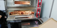 Photos du propriétaire du Pizzas à emporter Paddock pizza à Saint-Pierre-de-Rivière - n°1