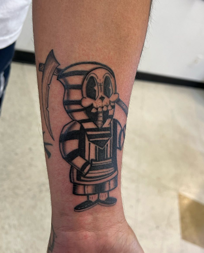 Find finger tattoo ideas for men for your next unique tattoo in Orange at Top Floor Tattoo Studio