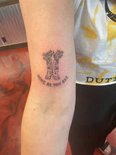 Explore background tattoo filler ideas, creative tattoo ideas in Rogers, available at Valhalla Tattoo & Piercing Studio