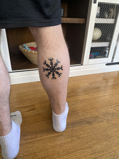 Explore small cross tattoo ideas, creative tattoo ideas in San Diego, available at Sideshow Tattoo and Piercing