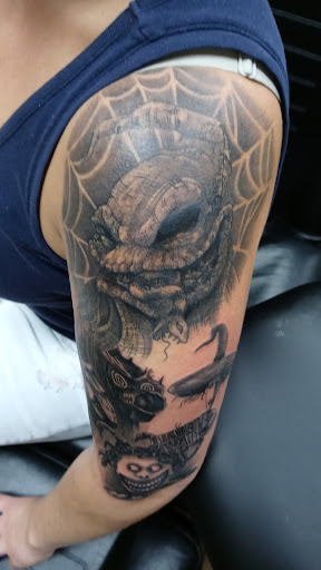 Explore saw movie tattoo ideas, creative tattoo ideas in Livonia, available at Eternal Tattoos Livonia