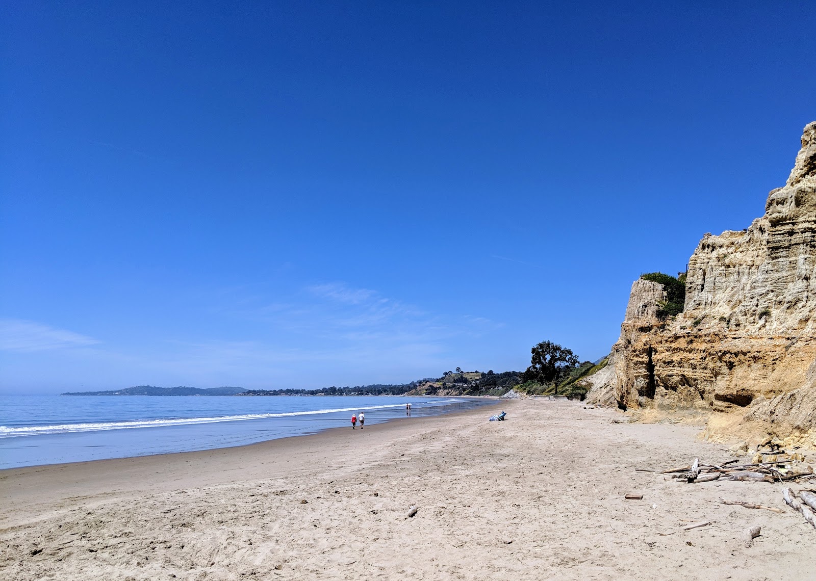 Foto von Loon Point Beach mit beiger sand Oberfläche